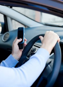 Distracted Driver - Atlanta Car Accident Lawyer - Trial Lawyers For Justice-Georgia